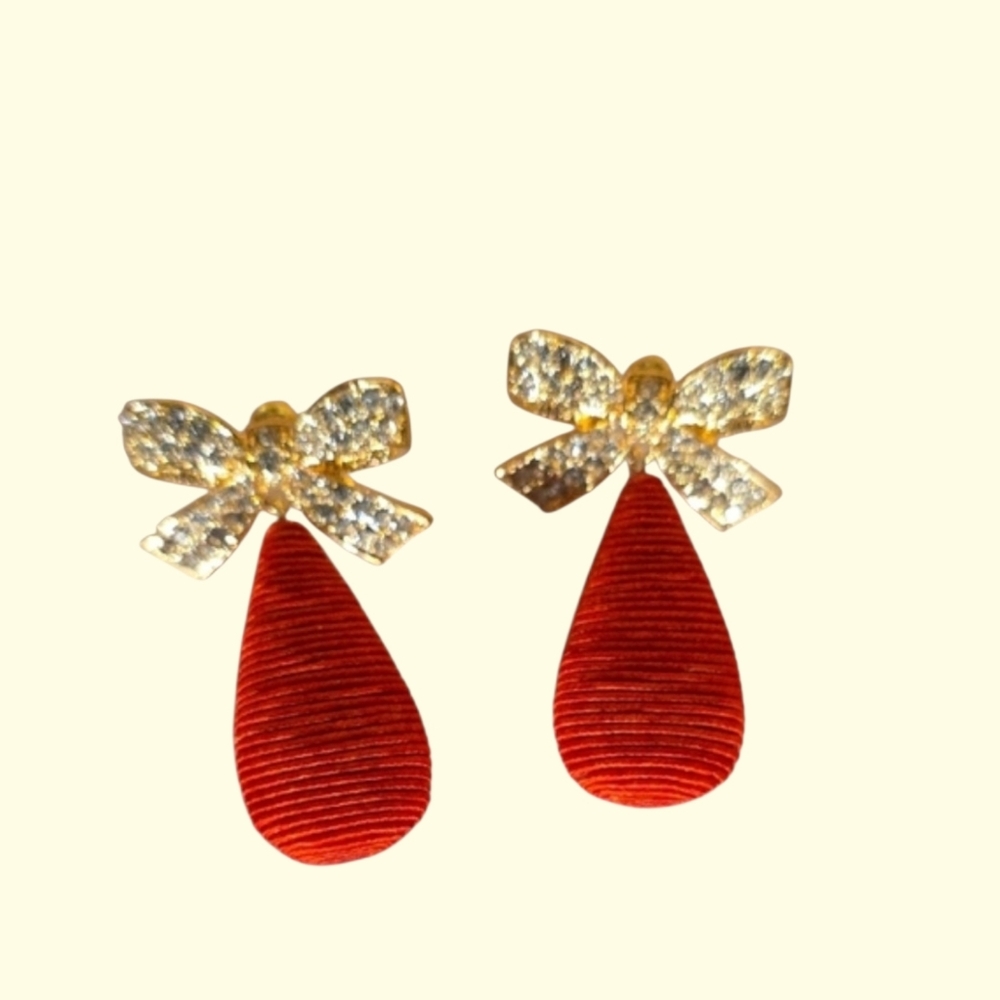 Elegant Gold and Red Bow Earrings